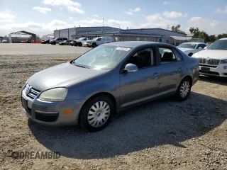 2009 Volkswagen Jetta S с VIN 3VWJZ71K49M014297, выставлен на аукционе Copart как лот 57055395 с пробегом 129 029 миль миль и Чистый • Clean title. История ставок и продаж доступна на DreamBid. Изображение 1.
