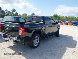 2015 Chevrolet Silverado 1500 LTZ with VIN 3GCUKSEC7FG145504, listed as a IAAI auction lot 41999825 with 206,560 mi miles and . Bid and sale history available at DreamBid. Image 4.