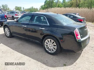2013 Chrysler 300 with VIN 2C3CCAKG2DH645193, listed as a IAAI auction lot 42105459 with 230,063 mi miles. Bid and sale history available at carsss.com. Image 3.