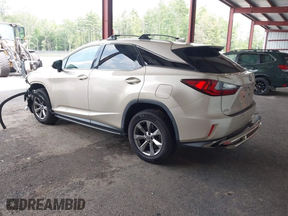 2019 Lexus RX 350 with VIN JTJBZMCA2K2039042, listed as a IAAI auction lot 42469481 with 84,794 mi miles and . Bid and sale history available at DreamBid. Image 3.