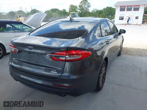 2019 Ford Fusion SE with VIN 3FA6P0HDXKR162353, listed as a IAAI auction lot 41970142 with 90,411 mi miles. Bid and sale history available at carsss.com. Image 4.