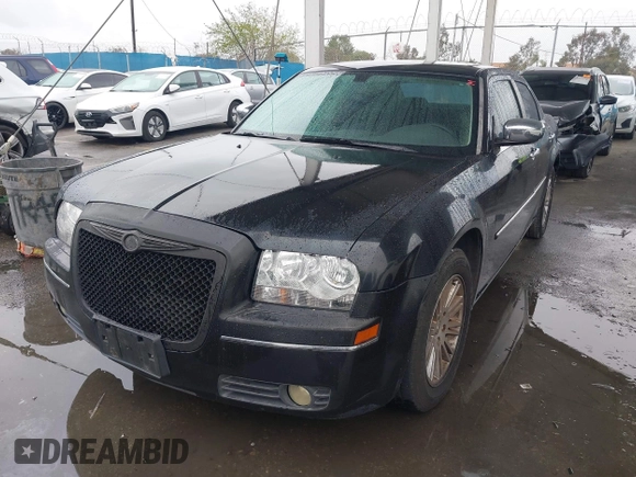 2010 Chrysler 300 Touring with VIN 2C3CA5CV6AH250021, listed as a IAAI auction lot 41811445 with 122,209 mi miles. Bid and sale history available at carsss.com. Image 2.