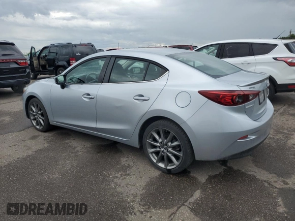 2018 Mazda 3 Touring z VIN 3MZBN1V38JM206424, wystawiony jako Copart lot #57914015 z przebiegiem 93 095 mil mil oraz Szkoda całkowita • Salvage title. Historia ofert i sprzedaży dostępna na DreamBid. Obrazek 2.