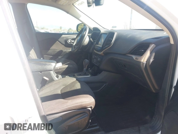 2016 Jeep Cherokee Latitude with VIN 1C4PJMCS9GW134769, listed as a IAAI auction lot 41668793 with 122,539 mi miles and . Bid and sale history available at carsss.com. Image 5.