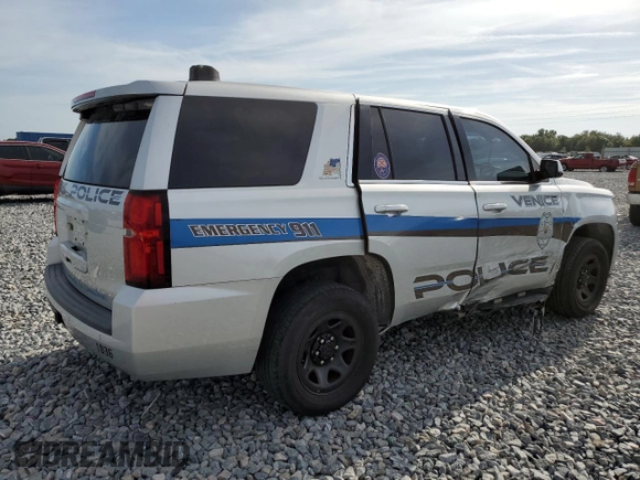 2018 Chevrolet Tahoe Commercial with VIN 1GNLCDEC2JR275159, listed as a Copart auction lot 61337355 with 84,712 mi miles and Salvage title. Bid and sale history available at DreamBid. Image 3.
