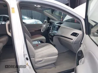 2014 Toyota Sienna LE AAS with VIN 5TDKK3DCXES499628, listed as a IAAI auction lot 42574730 with 110,532 mi miles and . Bid and sale history available at DreamBid. Image 5.