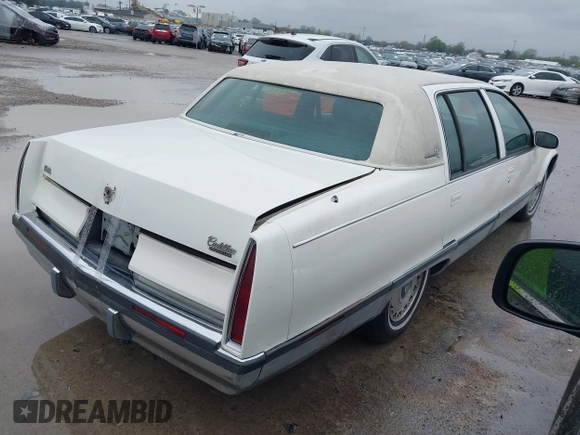 1996 Cadillac Fleetwood z VIN 1G6DW52P1TR700801, wystawiony jako IAAI lot #41945490 z przebiegiem 133 198 mil mil oraz . Historia ofert i sprzedaży dostępna na DreamBid. Obrazek 4.