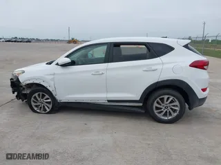 2016 Hyundai Tucson SE with VIN KM8J23A41GU232302, listed as a IAAI auction lot 42056851 with 119,159 mi miles. Bid and sale history available at carsss.com. Image 14.