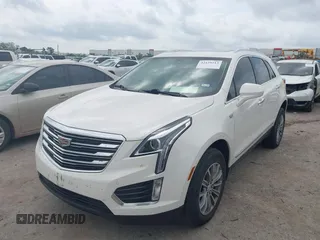 2019 Cadillac XT5 Luxury FWD z VIN 1GYKNCRSXKZ286643, wystawiony jako IAAI lot #42129213 z przebiegiem 87 091 mil mil oraz . Historia ofert i sprzedaży dostępna na DreamBid. Obrazek 17.