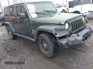 2007 Jeep Wrangler Unlimited X z VIN 1J4GA39127L231378, wystawiony jako IAAI lot #42252475 z przebiegiem 152 568 mil mil oraz . Historia ofert i sprzedaży dostępna na DreamBid. Obrazek 1.
