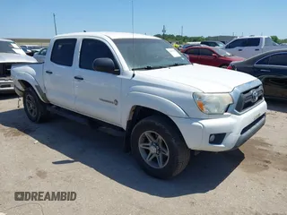 2012 Toyota Tacoma PreRunner z VIN 5TFJU4GN8CX022034, wystawiony jako IAAI lot #42003305 z przebiegiem 219 599 mil mil oraz . Historia ofert i sprzedaży dostępna na DreamBid. Obrazek 1.