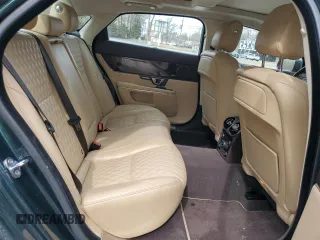 2016 Jaguar XJ Portfolio z VIN SAJWJ2GD0G8V92850, wystawiony jako Copart lot #47844065 z przebiegiem 99 652 mil mil oraz Szkoda całkowita • Salvage title. Historia ofert i sprzedaży dostępna na DreamBid. Obrazek 10.