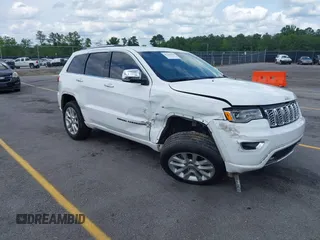 2017 Jeep Grand Cherokee Overland z VIN 1C4RJECG8HC813686, wystawiony jako IAAI lot #42220435 z przebiegiem 116 886 mil mil oraz . Historia ofert i sprzedaży dostępna na DreamBid. Obrazek 1.