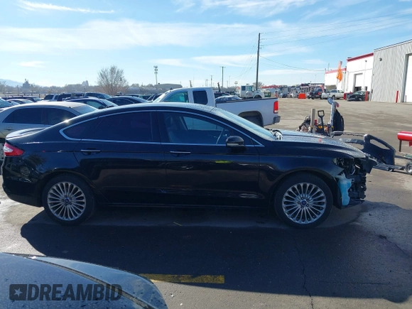 2016 Ford Fusion Titanium with VIN 3FA6P0K9XGR152837, listed as a IAAI auction lot 41647436 with 196,700 mi miles. Bid and sale history available at carsss.com. Image 13.
