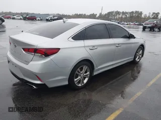 2018 Hyundai Sonata SEL with VIN 5NPE34AF0JH696872, listed as a IAAI auction lot 41070305 with 121,000 mi miles and . Bid and sale history available at DreamBid. Image 4.