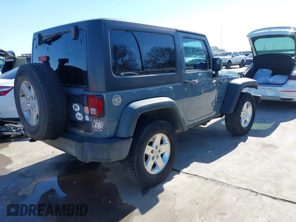 2014 Jeep Wrangler Sport with VIN 1C4AJWAGXEL177449, listed as a IAAI auction lot 41741519 with 117,056 mi miles and . Bid and sale history available at carsss.com. Image 4.