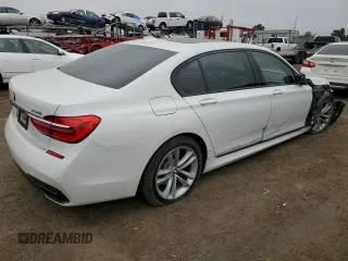 2016 BMW 7 Series 750i with VIN WBA7F0C50GGL99642, listed as a Copart auction lot 64986753 with 69,531 mi miles. Bid and sale history available at carsss.com. Image 3.