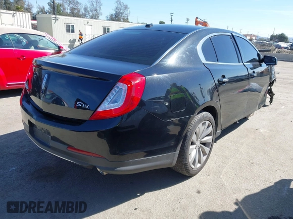 2014 Lincoln MKS with VIN 1LNHL9DK7EG608912, listed as a IAAI auction lot 41722004 with 211,051 mi miles. Bid and sale history available at carsss.com. Image 4.