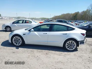 2023 Tesla Model 3 with VIN 5YJ3E1EA7PF592966, listed as a IAAI auction lot 41879794 with 13,423 mi miles and . Bid and sale history available at carsss.com. Image 15.
