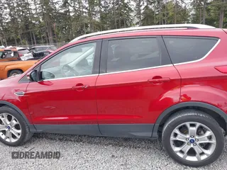 2014 Ford Escape Titanium with VIN 1FMCU9J9XEUD71715, listed as a IAAI auction lot 42127982 with 96,549 mi miles and . Bid and sale history available at DreamBid. Image 14.