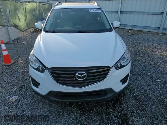 2016 Mazda CX-5 Sport with VIN JM3KE2BY3G0877107, listed as a Copart auction lot 87621635 with 83,093 mi miles and Salvage Title. Bid and sale history available at carsss.com. Image 11.