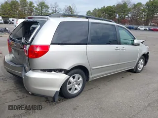2008 Toyota Sienna XLE with VIN 5TDZK22C38S151671, listed as a IAAI auction lot 41046569 with 119,239 mi miles. Bid and sale history available at carsss.com. Image 4.