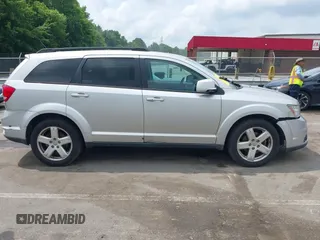 2012 Dodge Journey SXT z VIN 3C4PDCBGXCT324756, wystawiony jako IAAI lot #42422533 z przebiegiem 241 934 mil mil oraz . Historia ofert i sprzedaży dostępna na DreamBid. Obrazek 13.