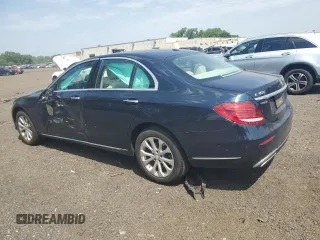 2017 Mercedes-Benz E 300 Luxury with VIN WDDZF4KBXHA185598, listed as a Copart auction lot 61011935 with 59,116 mi miles and Salvage title. Bid and sale history available at DreamBid. Image 2.