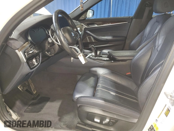 2018 BMW 5 Series 540i xDrive with VIN WBAJE7C53JWC54662, listed as a Copart auction lot 63703595 with 96,523 mi miles and Salvage title. Bid and sale history available at DreamBid. Image 7.