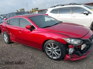 2014 Mazda 6 i Touring with VIN JM1GJ1V64E1122716, listed as a IAAI auction lot 42735522 with 84,335 mi miles and . Bid and sale history available at DreamBid. Image 1.