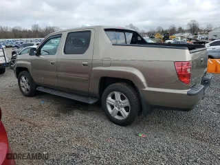 2011 Honda Ridgeline RTL with VIN 5FPYK1F51BB004639, listed as a Copart auction lot 49826765 with 284,356 mi miles and Clean Title. Bid and sale history available at carsss.com. Image 2.