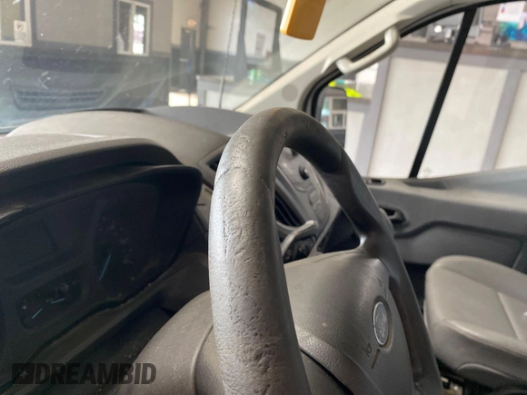 2015 Ford Transit Cargo with VIN 1FTNE1YM3FKA97437, listed as a IAAI auction lot 42786905 with 258,546 mi miles and . Bid and sale history available at DreamBid. Image 7.