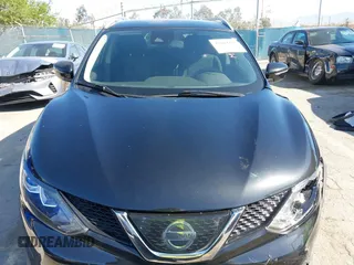 2019 Nissan Rogue Sport S with VIN JN1BJ1CPXKW233049, listed as a IAAI auction lot 42004455 with 63,427 mi miles. Bid and sale history available at carsss.com. Image 12.