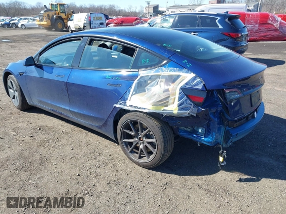 2023 Tesla Model 3 with VIN 5YJ3E1EA2PF690335, listed as a IAAI auction lot 41732701 with 22,238 mi miles and . Bid and sale history available at DreamBid. Image 3.