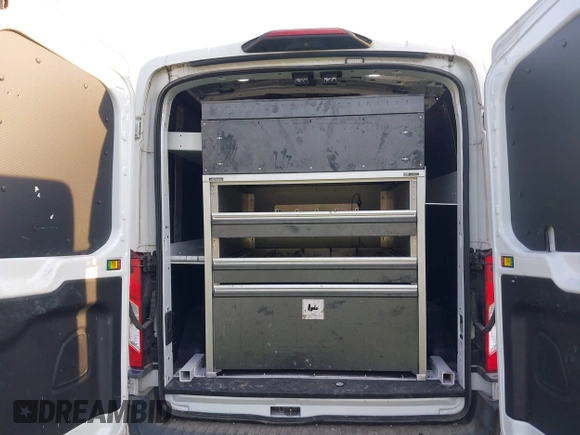 2019 Ford Transit z VIN 1FTYR2CM9KKB07381, wystawiony jako IAAI lot #42506233 z przebiegiem 96 311 mil mil oraz . Historia ofert i sprzedaży dostępna na DreamBid. Obrazek 19.
