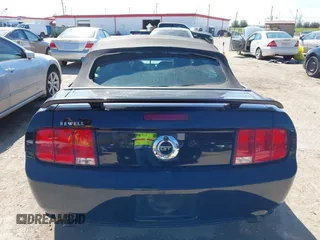 2005 Ford Mustang GT Deluxe with VIN 1ZVFT85H455226449, listed as a IAAI auction lot 41771971 with 128,570 mi miles and . Bid and sale history available at DreamBid. Image 16.