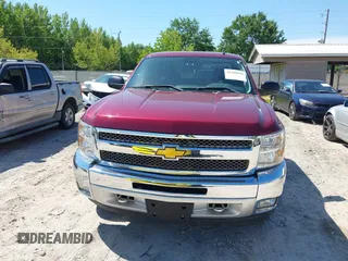 2013 Chevrolet Silverado 1500 LT with VIN 1GCRKSE77DZ215203, listed as a IAAI auction lot 42200656 with 115,102 mi miles and . Bid and sale history available at DreamBid. Image 6.