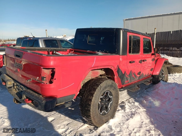 2020 Jeep Gladiator Rubicon with VIN 1C6JJTBG0LL138631, listed as a Copart auction lot 46883035 with 58,067 mi miles and Salvage Title. Bid and sale history available at carsss.com. Image 3.