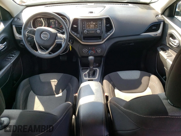 2015 Jeep Cherokee Sport z VIN 1C4PJLAB4FW731128, wystawiony jako Copart lot #56358915 z przebiegiem 100 455 mil mil oraz Czysty tytuł • Clean title. Historia ofert i sprzedaży dostępna na DreamBid. Obrazek 8.