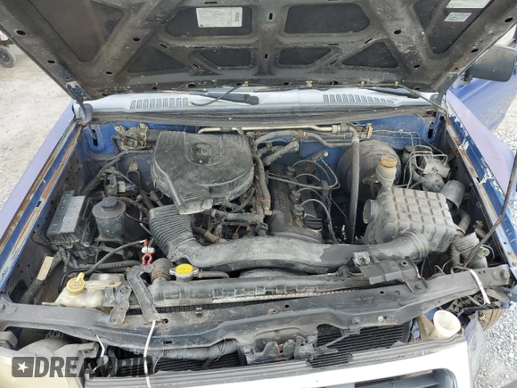 1998 Nissan Frontier XE z VIN 1N6DD26Y2WC351446, wystawiony jako Copart lot #60441815 z przebiegiem Nie podano mil oraz Szkoda całkowita • Salvage title. Historia ofert i sprzedaży dostępna na DreamBid. Obrazek 11.