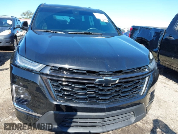 2023 Chevrolet Traverse Premier with VIN 1GNERKKW5PJ128805, listed as a IAAI auction lot 42032622 with 36,463 mi miles and . Bid and sale history available at DreamBid. Image 6.