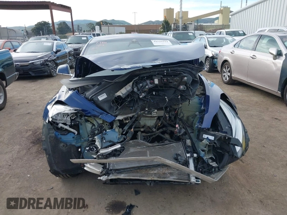 2018 Tesla Model 3 Long Range Battery z VIN 5YJ3E1EA3JF043451, wystawiony jako IAAI lot #41529214 z przebiegiem 65 375 mil mil oraz . Historia ofert i sprzedaży dostępna na DreamBid. Obrazek 13.
