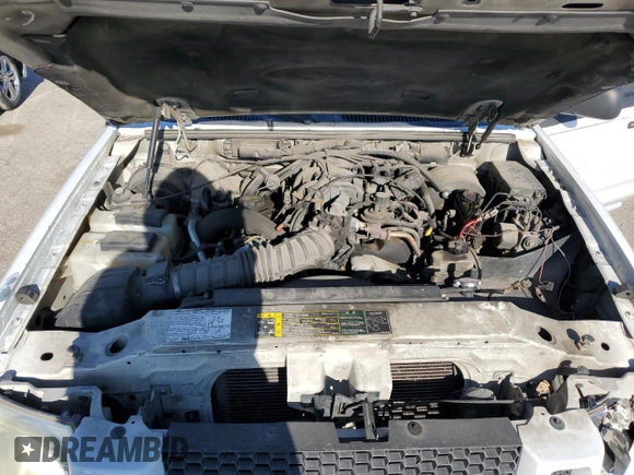 2004 Ford Explorer Sport Trac XLS с VIN 1FMZU67K84UA83242, выставлен на аукционе Copart как лот 50151004 с пробегом Не указан миль и Списание • Salvage title. История ставок и продаж доступна на DreamBid. Изображение 13.
