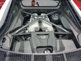 2020 Audi R8 z VIN WUAKBAFX9L7900195, wystawiony jako Copart lot #59888215 z przebiegiem 16 548 mil mil oraz Czysty tytuł • Clean title. Historia ofert i sprzedaży dostępna na DreamBid. Obrazek 11.