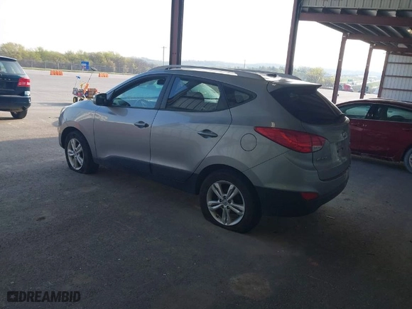 2013 Hyundai Tucson GLS with VIN KM8JU3AC6DU769194, listed as a IAAI auction lot 42018641 with 169,537 mi miles. Bid and sale history available at carsss.com. Image 3.
