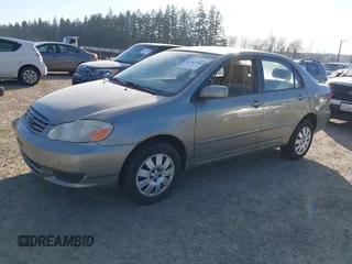 2004 Toyota Corolla CE with VIN JTDBR38E842043849, listed as a IAAI auction lot 41703290 with 299,999 mi miles. Bid and sale history available at carsss.com. Image 2.