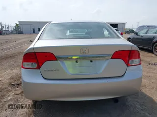 2009 Honda Civic EX-L z VIN 19XFA16979E010306, wystawiony jako IAAI lot #42285380 z przebiegiem 210 547 mil mil oraz . Historia ofert i sprzedaży dostępna na DreamBid. Obrazek 17.