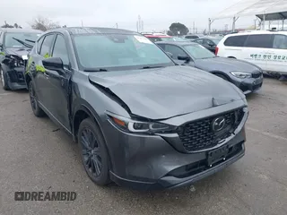 2022 Mazda CX-5 2.5 Turbo with VIN JM3KFBAY8N0647204, listed as a IAAI auction lot 41567490 with 40,396 mi miles and . Bid and sale history available at carsss.com. Image 1.