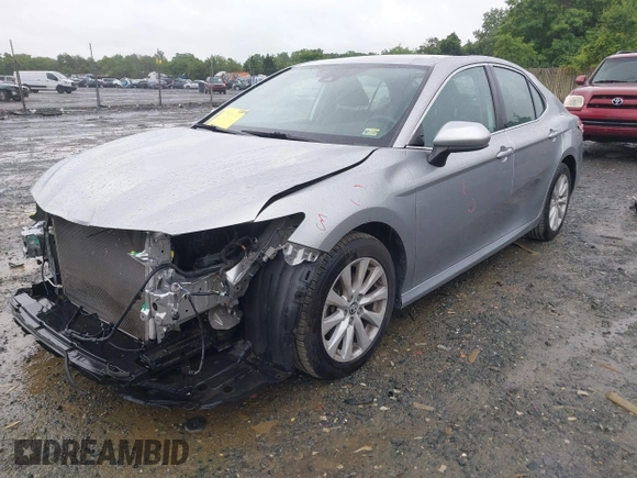 2019 Toyota Camry LE z VIN 4T1B11HK0KU698215, wystawiony jako IAAI lot #42319699 z przebiegiem 54 864 mil mil oraz . Historia ofert i sprzedaży dostępna na DreamBid. Obrazek 18.