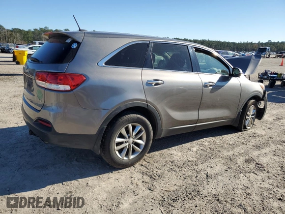2016 Kia Sorento L with VIN 5XYPG4A37GG184318, listed as a Copart auction lot 87213954 with Not Provided miles and Salvage Title. Bid and sale history available at DreamBid. Image 3.